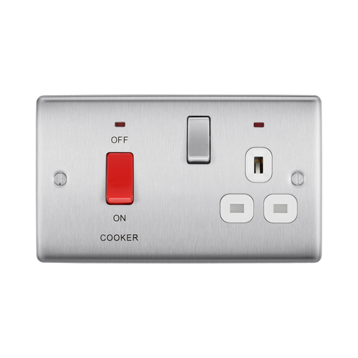 Metallic electrical switch with red button and multiple sockets on a white background