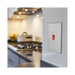 Metallic light switch with red button on a white background profile kitchen setting