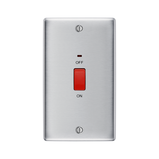 Metallic light switch with red button on a white background