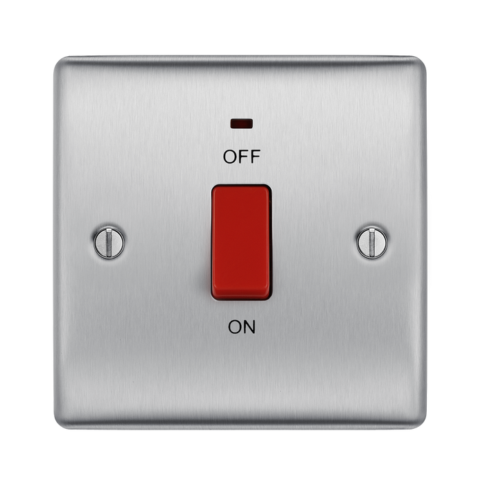 Metallic light switch with red toggle button on a white background