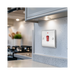 Metallic light switch with red toggle button on a white background kitchen setting