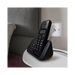 Metallic telephone switch on a white background bedside table