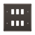 Black wall plate with six white rocker switches on a white background