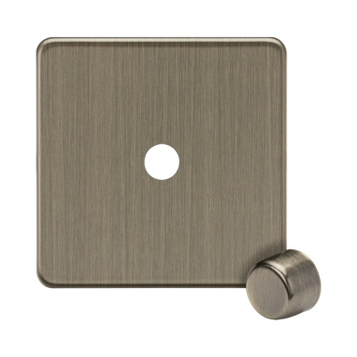 Antique Brass square wall plate with a round knockout on a white background