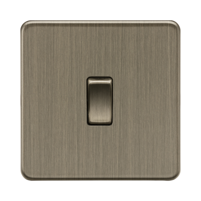 Antique Brass light switch with a single switch on a white background