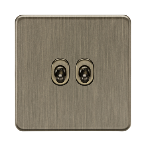 Antique Brass double socket switch on a white background