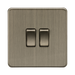 Antique Brass double switch on a white background