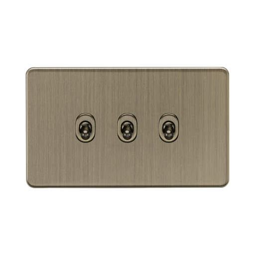 Antique Brass three-gang wall plate with sockets on a white background