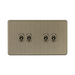 Antique Brass four-gang switch on a white background