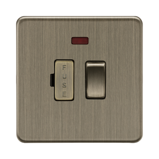 Antique Brass fuse switch with indicator light on a white background