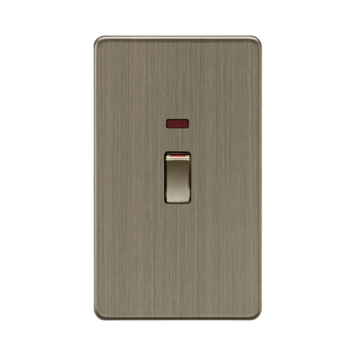 Antique Brass switch with a red indicator on a white background