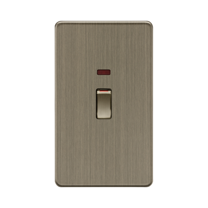 Antique Brass switch with a red indicator on a white background