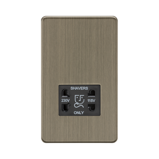 Antique Brass wall socket with shaver outlet on a white background