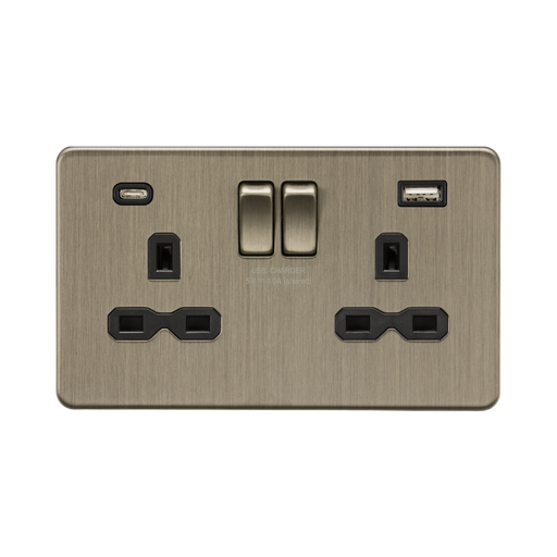 Antique Bronze electrical socket with USB ports and switches on a white background