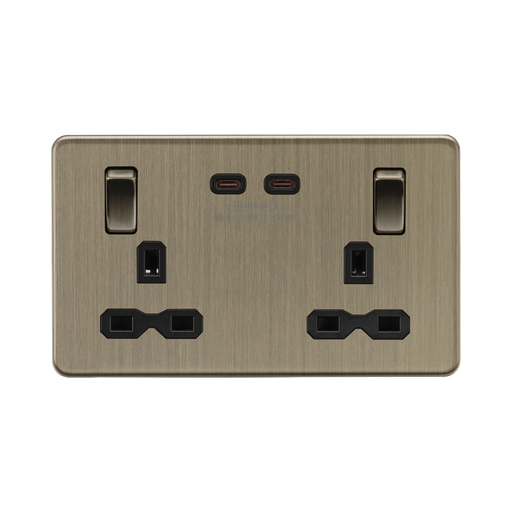 Antique Brass electrical socket with multiple outlets on a white background