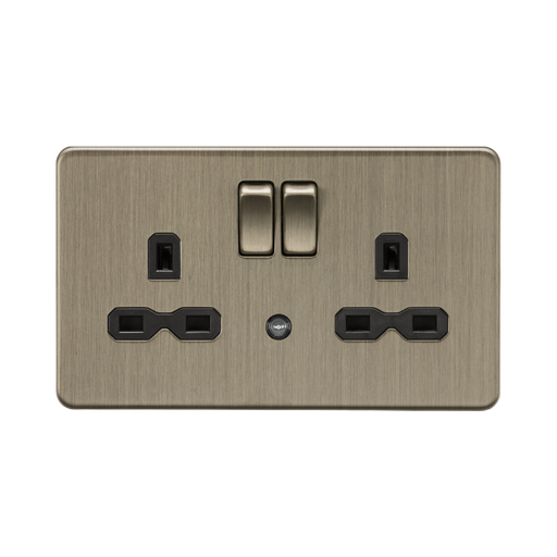 Antique Brass electrical socket with two outlets and a switch on a white background