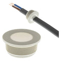 A fire retardant membrane grommet alongside a cable, against a white background.