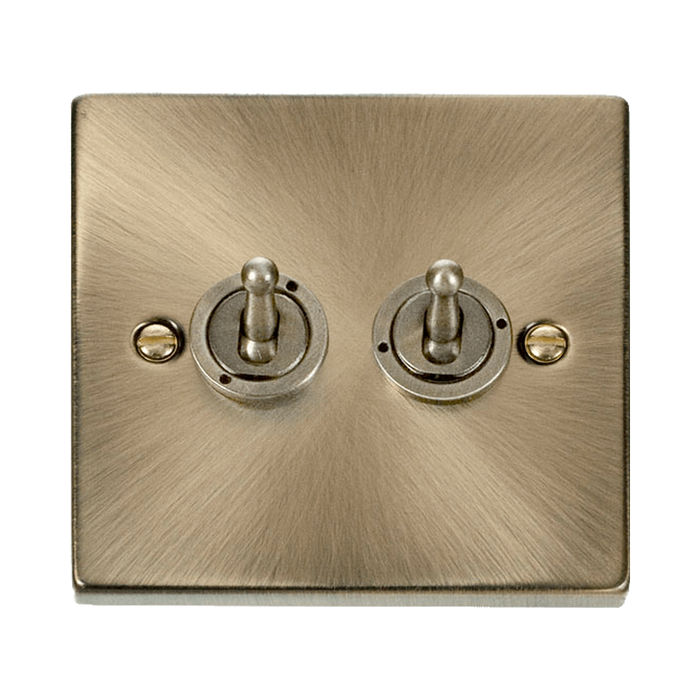 Front view of Click Deco Antique Brass 2G Toggle Switch