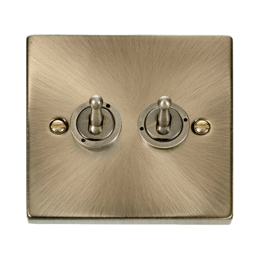 Front view of Click Deco Antique Brass 2G Toggle Switch