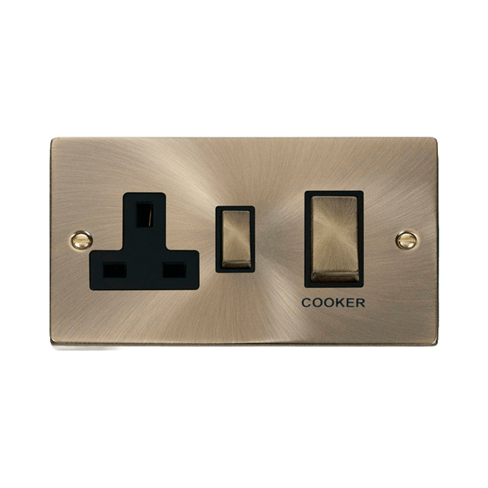 Front view of Click Deco Antique Brass 45A Cooker Switch with 13A Socket