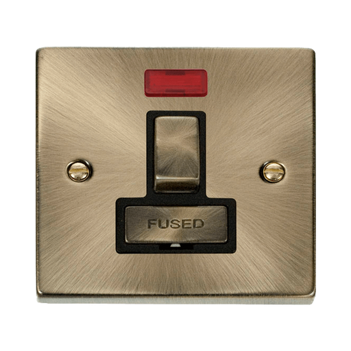 Front view of Click Deco Antique Brass 13A Switched Spur with Neon