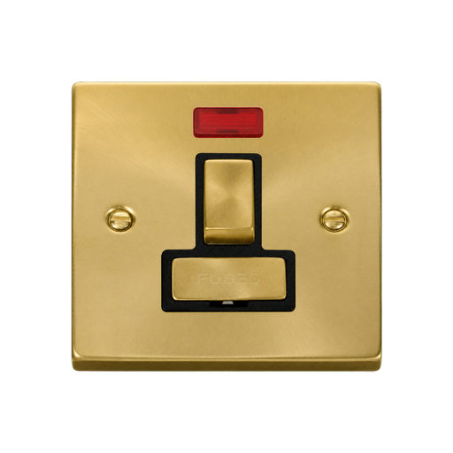 Front view of Click Deco Satin Brass 13A Switched Spur with Neon